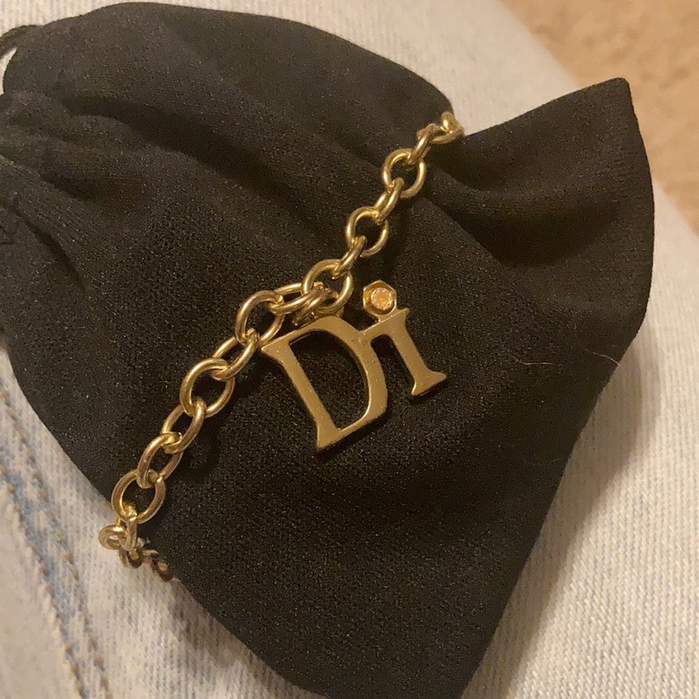 Diamonds International (DI) Gold Tone Caribbean Charm Bracelet